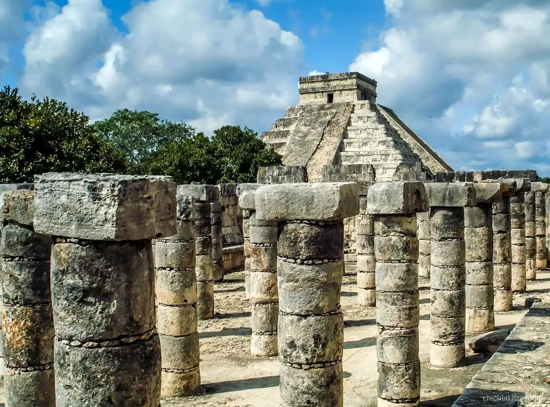 Self-guided visitor exploring Chichen Itza with the express entry ticket